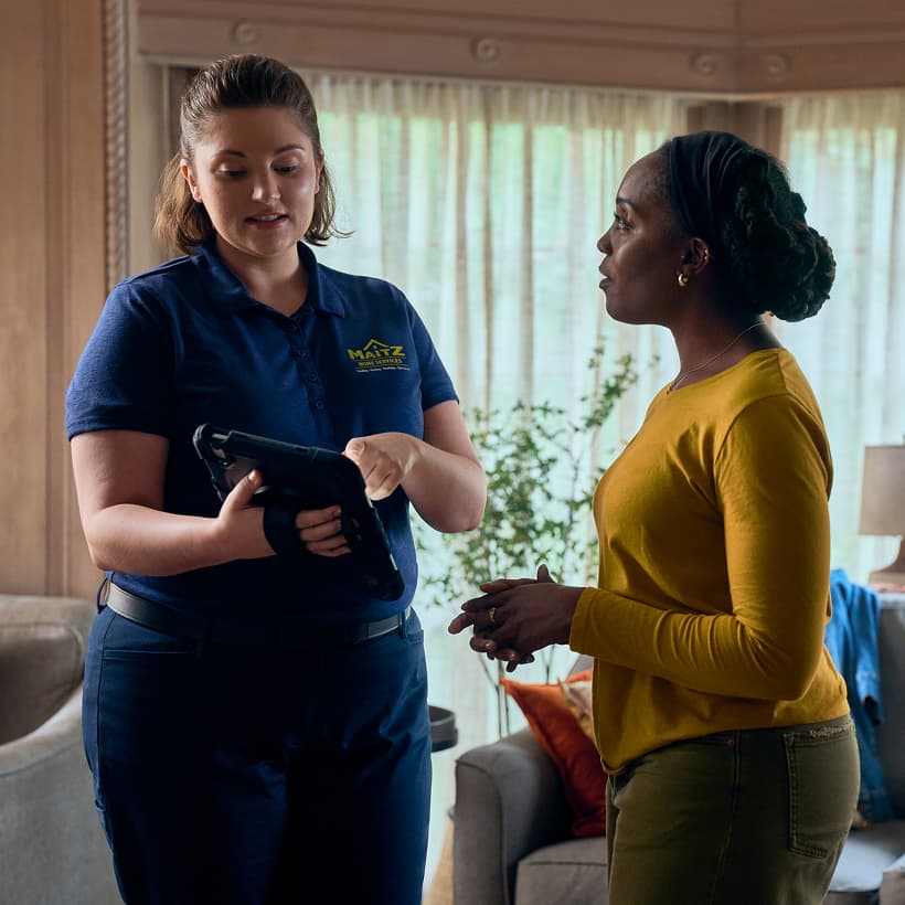 A Maitz Comfort Advisor discuss our Comfort360 Membership benefits with a homeowner.