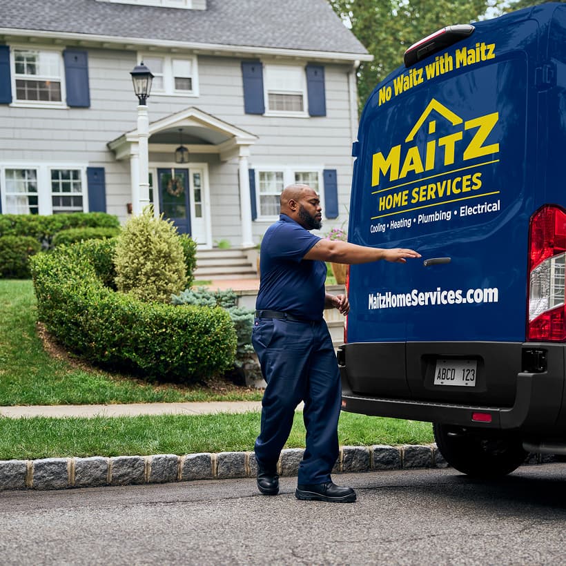 A Maitz technician arrives at a home ready to provide expert HVAC, plumbing, and electrical services.