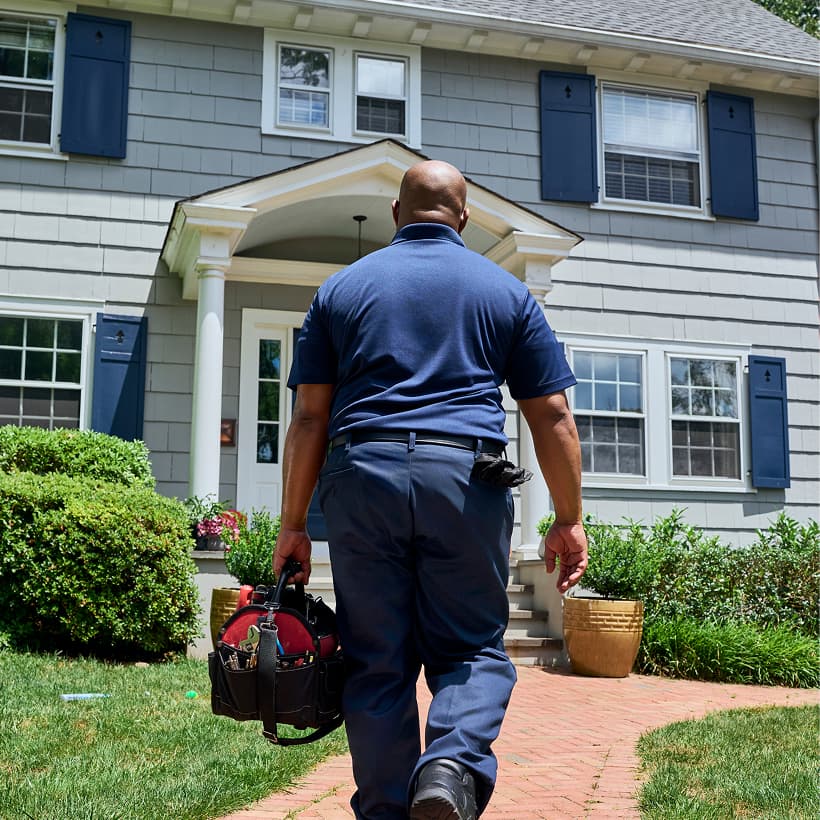 A Maitz technician arrives at a home ready to provide expert HVAC, plumbing, and electrical services.